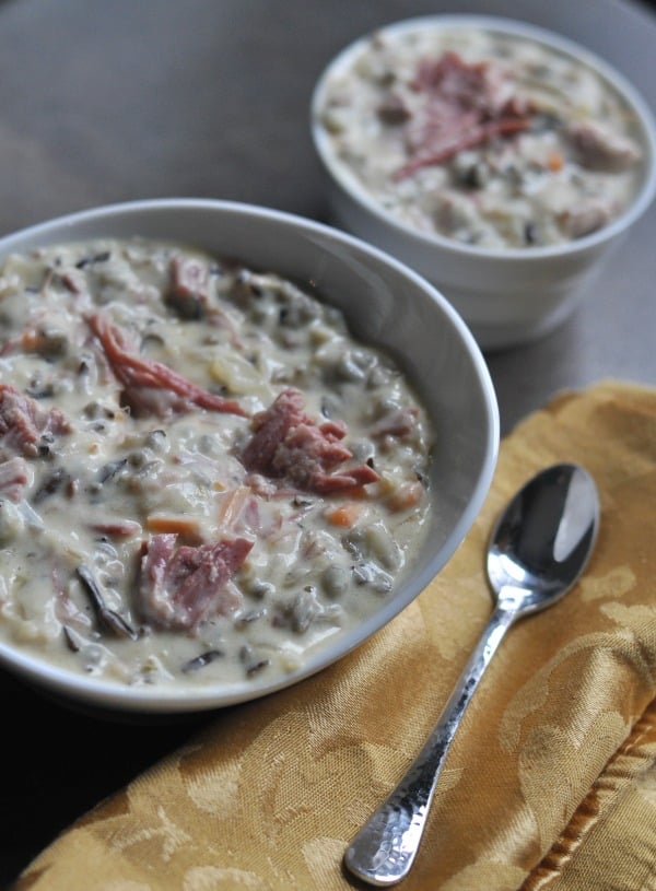 Corned Beef Wild Rice Soup is a St. Patrick's Day twist on the Minnesota classic. Creamy wild rice soup made with Guinness corned beef and sauerkraut. https://diningwithalice.com/soup/corned-beef-wild-rice-soup/