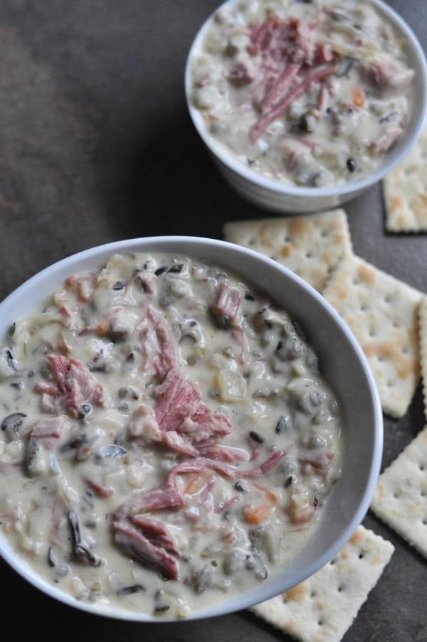 Corned Beef Wild Rice Soup is a St. Patrick's Day twist on the Minnesota classic. Creamy wild rice soup made with Guinness corned beef and sauerkraut. https://diningwithalice.com/soup/corned-beef-wild-rice-soup/