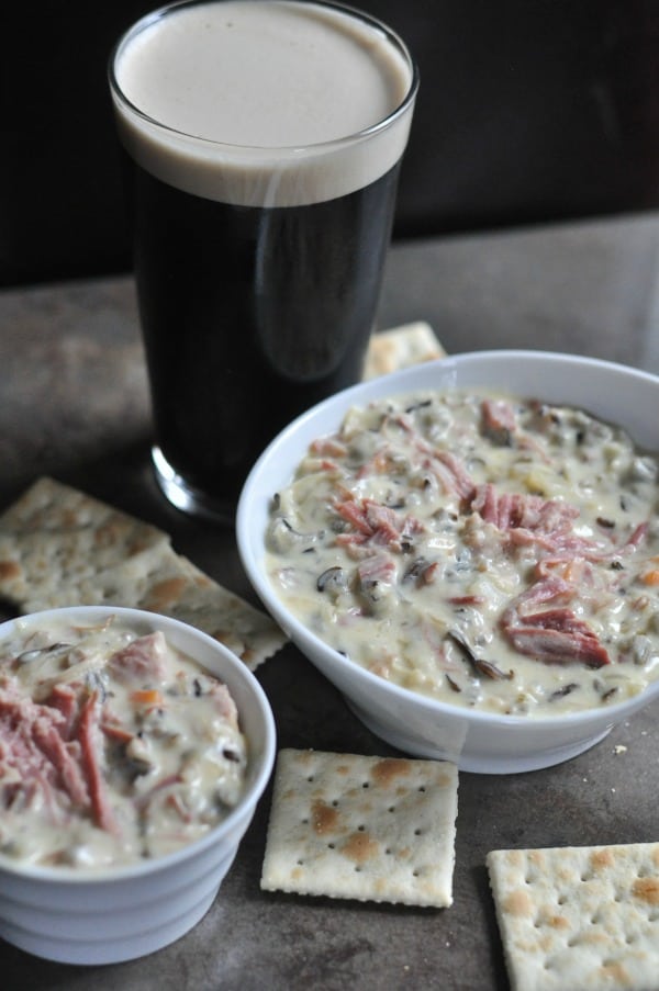 Corned Beef Wild Rice Soup is a St. Patrick's Day twist on the Minnesota classic. Creamy wild rice soup made with Guinness corned beef and sauerkraut. https://diningwithalice.com/soup/corned-beef-wild-rice-soup/