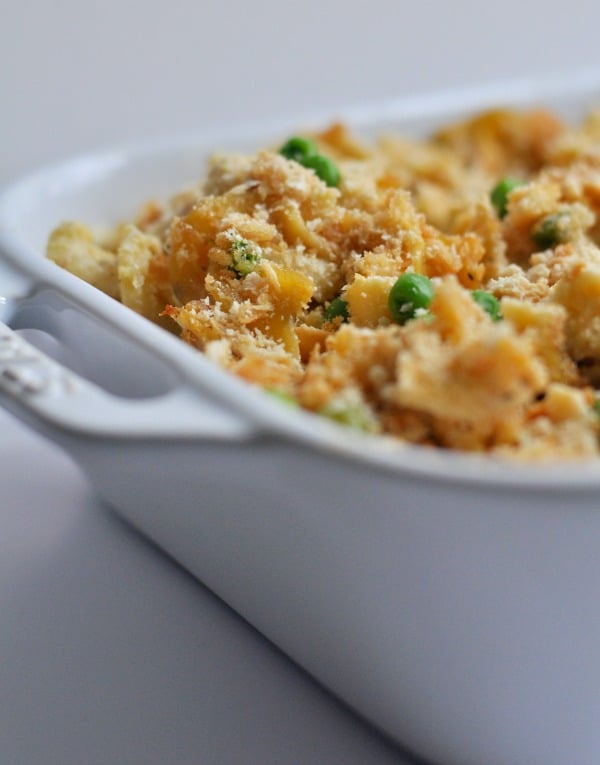 Easy Chicken Noodle Casserole recipe made with a creamy garlic and parmesan sauce, rotisserie chicken and topped with a buttery cracker topping. https://diningwithalice.com/weeknight-meals/chicken-noodle-casserole/