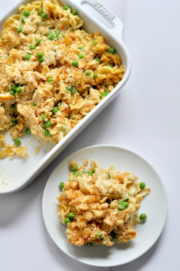 Easy Chicken Noodle Casserole recipe made with a creamy garlic and parmesan sauce, rotisserie chicken and topped with a buttery cracker topping. https://diningwithalice.com/weeknight-meals/chicken-noodle-casserole/