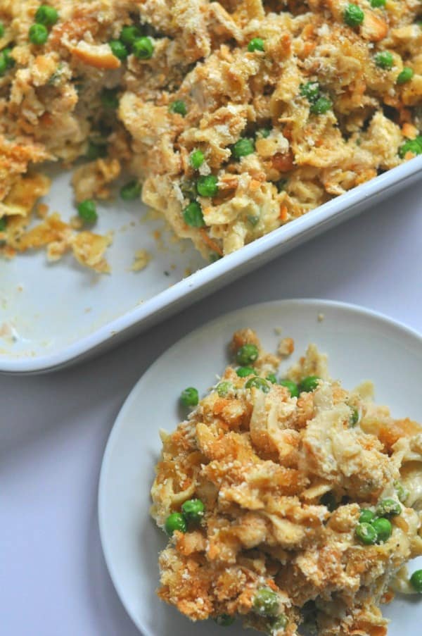 Easy Chicken Noodle Casserole recipe made with a creamy garlic and parmesan sauce, rotisserie chicken and topped with a buttery cracker topping. https://diningwithalice.com/weeknight-meals/chicken-noodle-casserole/