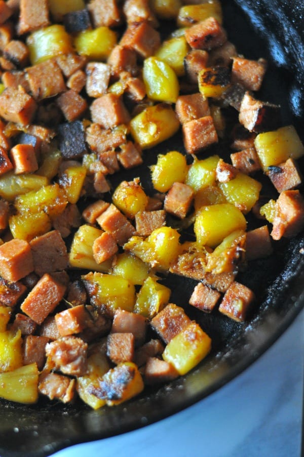 Hawaiian SPAM Skillet Dinner is an easy weeknight meal made with seasoned Pineapple and Mango. https://diningwithalice.com/weeknight-meals/hawaiian-spam-skillet-dinner/ 