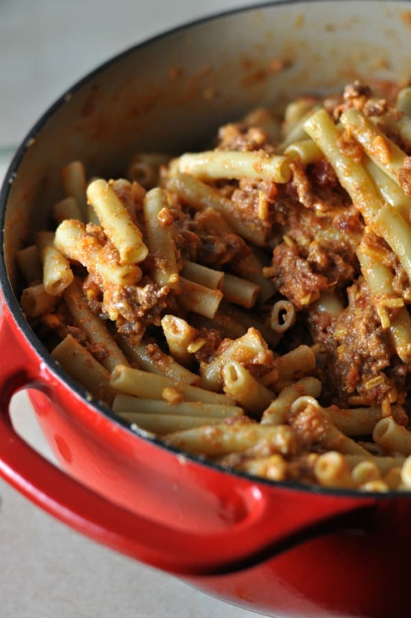 This Bacon Cheeseburger Pasta Bake recipe is an easy and cheesy casserole made with ground beef that is kid-friendly and a perfect family weeknight meal with leftovers.  https://diningwithalice.com/weeknight-meals/bacon-cheeseburger-pasta-bake/