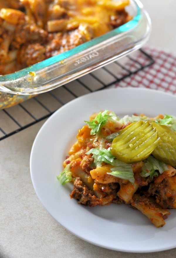 This Bacon Cheeseburger Pasta Bake recipe is an easy and cheesy casserole made with ground beef that is kid-friendly and a perfect family weeknight meal with leftovers.  https://diningwithalice.com/weeknight-meals/bacon-cheeseburger-pasta-bake/