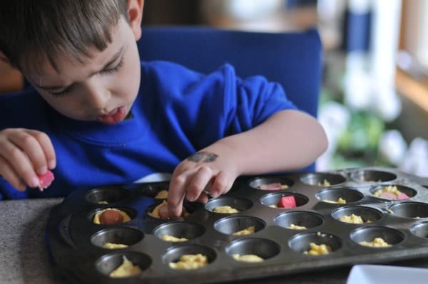 Cheesy Mini Corn Dog Muffins Kids Lunch Ideas A super easy Cheesy Mini Corn Dog Muffins recipe that makes a great weeknight meal, fun school lunch, or game day appetizer. https://diningwithalice.com/kids/cheesy-mini-corn-dog-muffins/