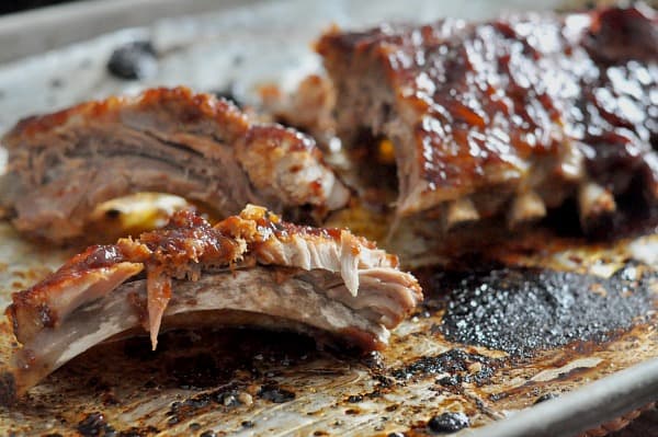 The best Instant Pot Ribs recipe for tender ribs that fall off the bone! Super easy and kid-friendly! Seasoned with a sweet and smoky rub and finished with a honey bbq sauce. Make in your Instant Pot or Crock-Pot Slow Cooker!