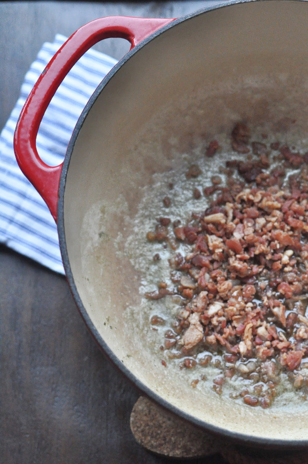 bacon sizzling in a soup pop Original Turkey Tetrazzini recipe with leftover turkey and a cream cheese sauce! A traditional Turkey Tetrazzini recipe great for a crowd!